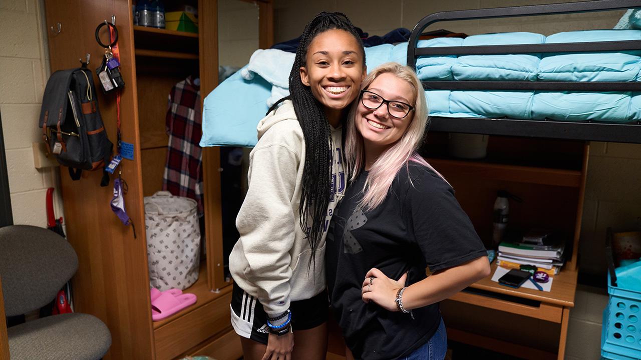 Two students in dorm room